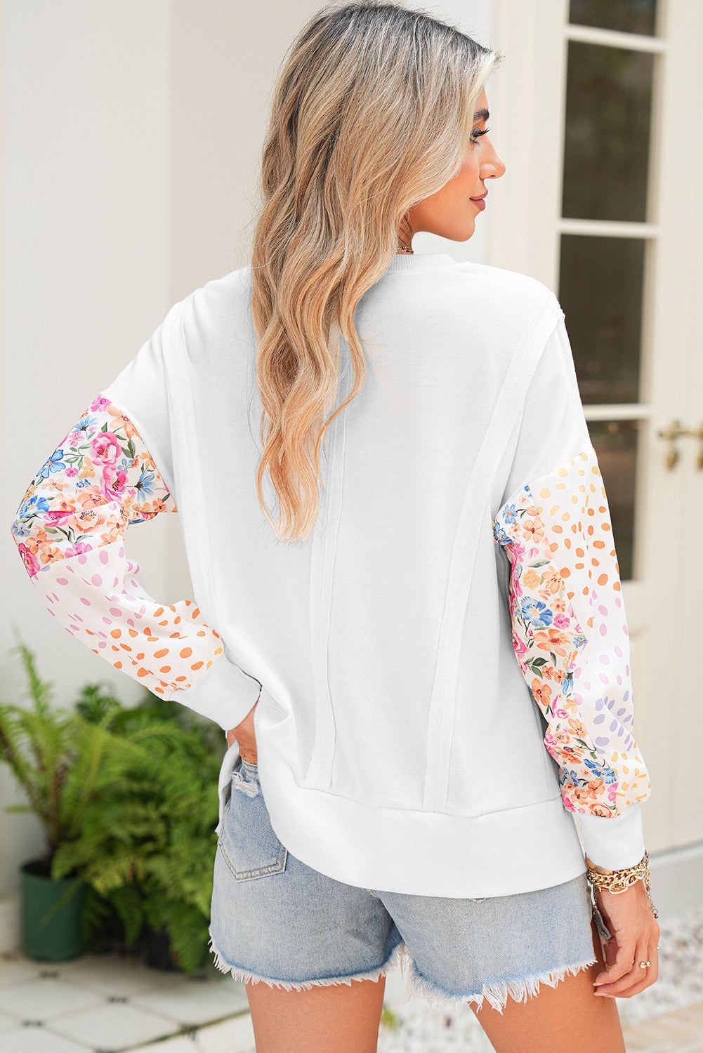 White Floral Dotted Print Patchwork Sleeve High Low Sweatshirt c55fc99b2f8eda6c
