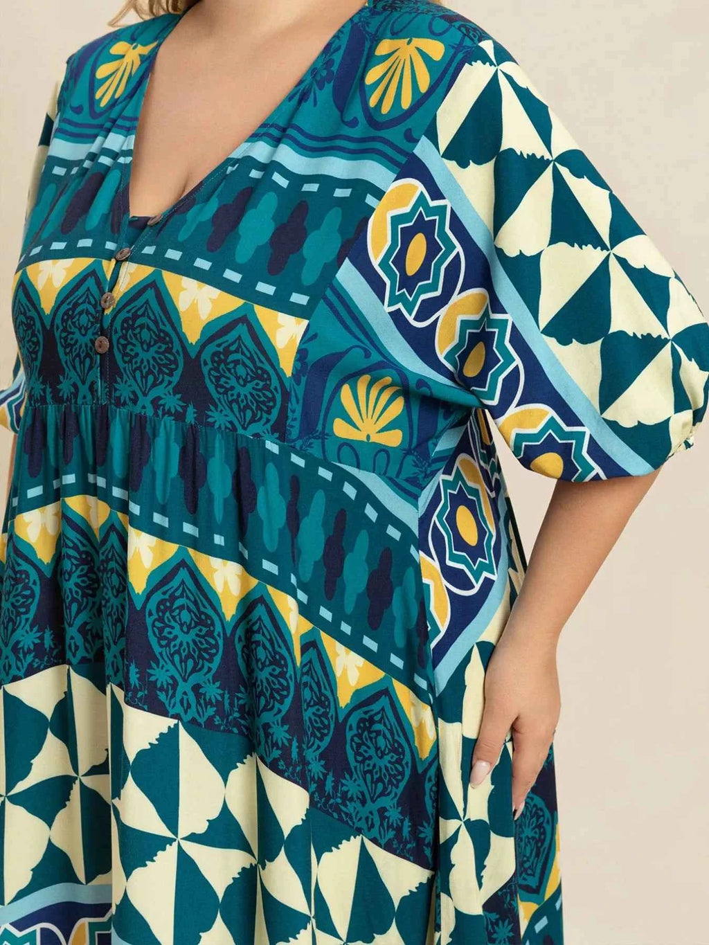 Plus Size Printed V-Neck Half Sleeve Midi Dress c6a35d25-5a7d-41b8-8585-af81ec032695-Max-Origin