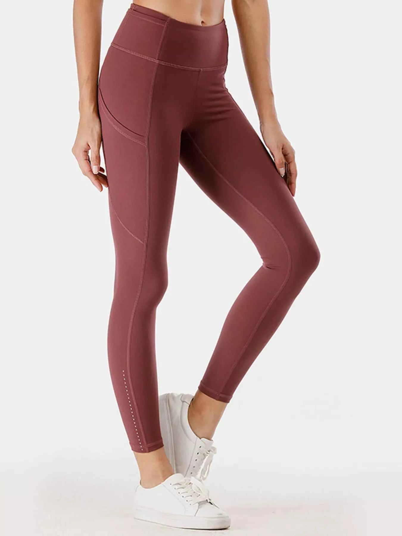 Full Size High-Waisted Active Leggings with Pockets Plus Size c6d5bf95b6674e3a82abaac7e25082b7-Max-Origin