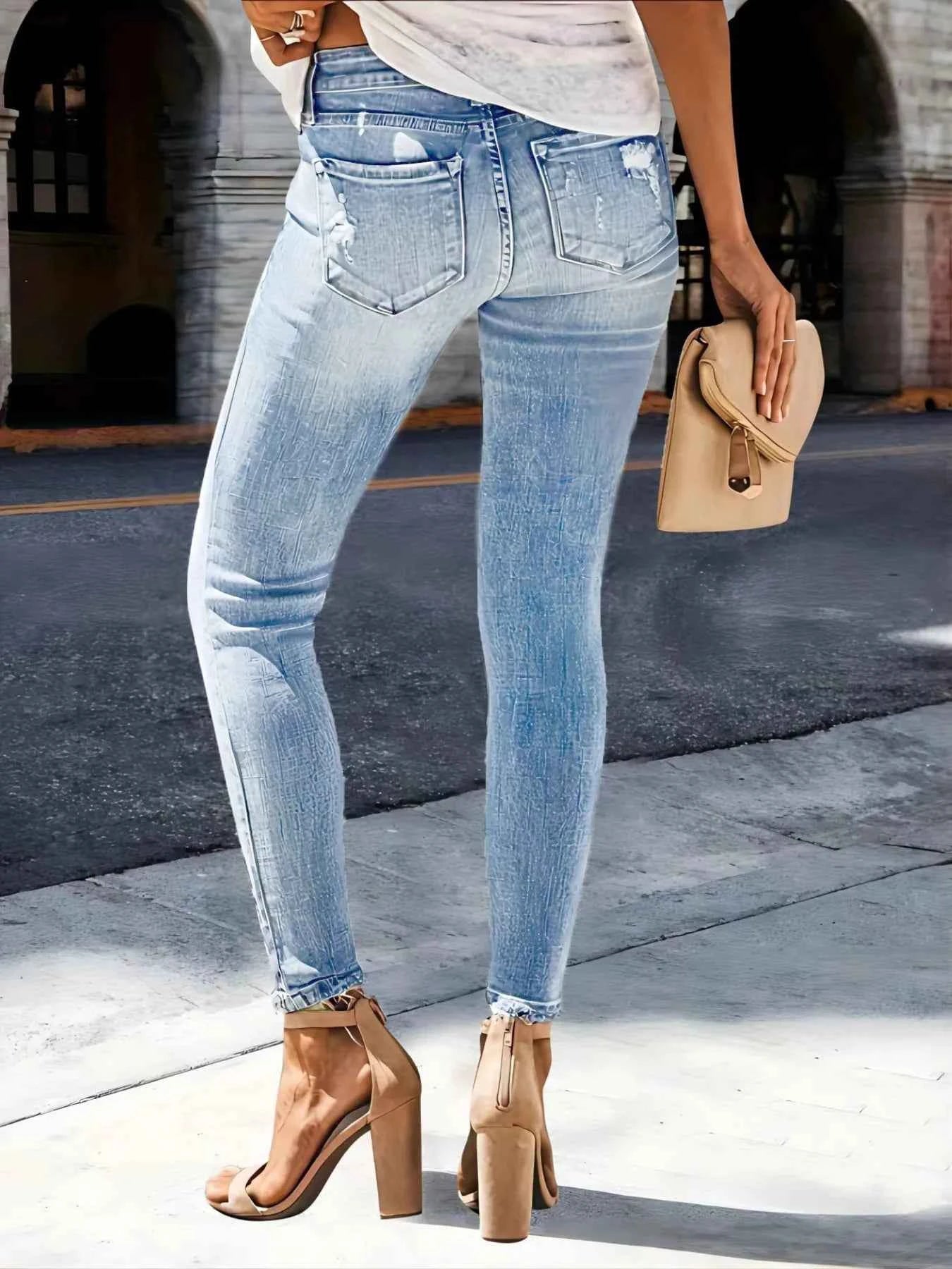 Distressed Skinny Jeans c85d48f2982c4a8aa92cad5e0089c445-Max-Origin