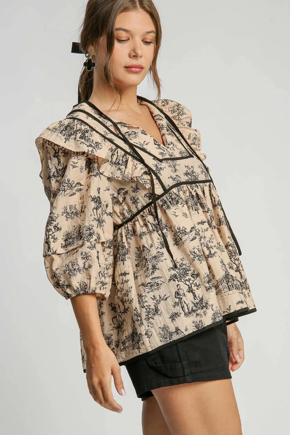 Umgee Ruffled Tie Neck Puff Sleeve Babydoll Blouse c8f5c6fc-111d-42ca-8152-daadc37ee345-Max