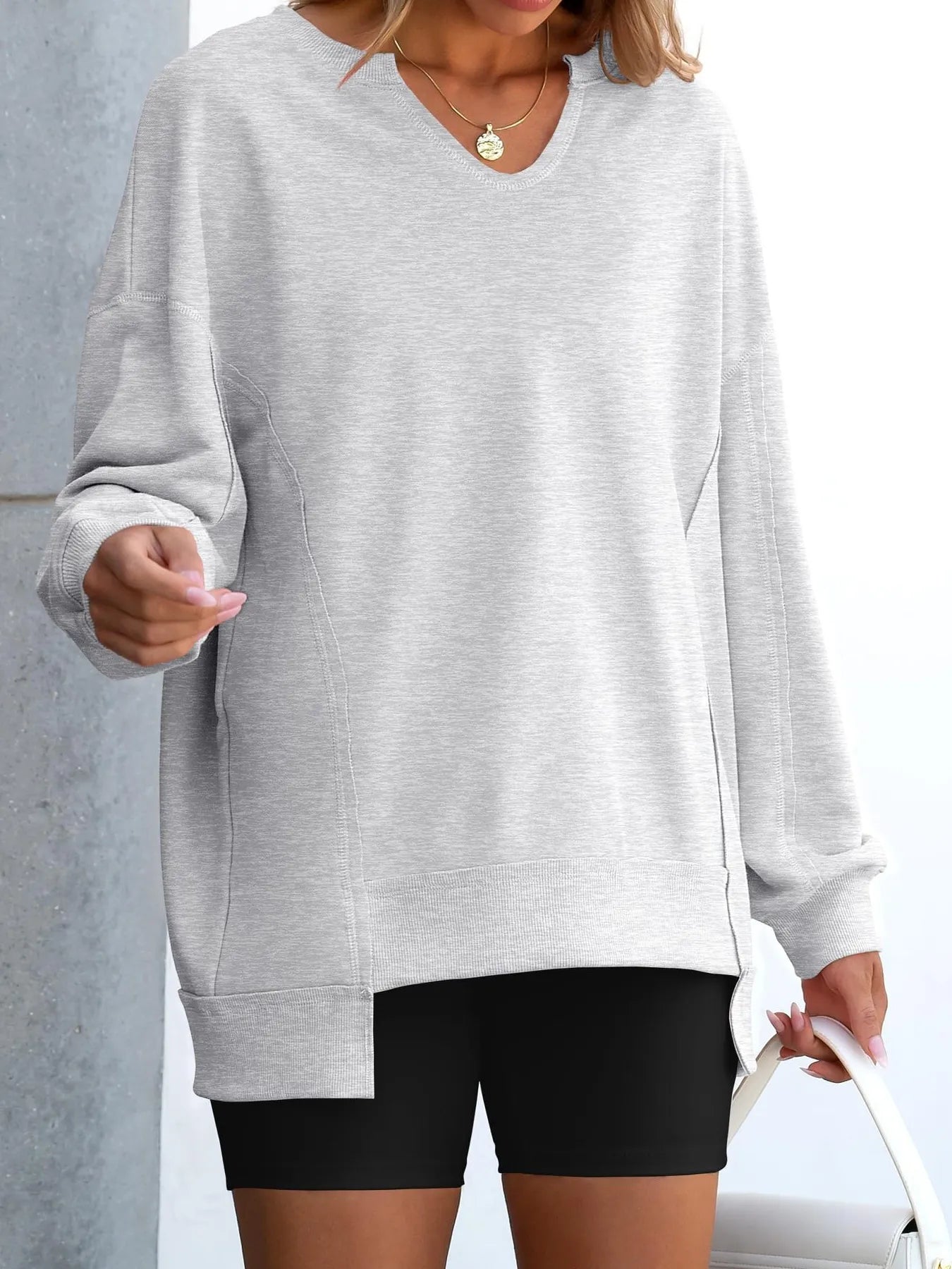 Notched Long Sleeve Oversized Sweatshirt c993ede81a054797b3bd9d305f983ef1-Max-Origin