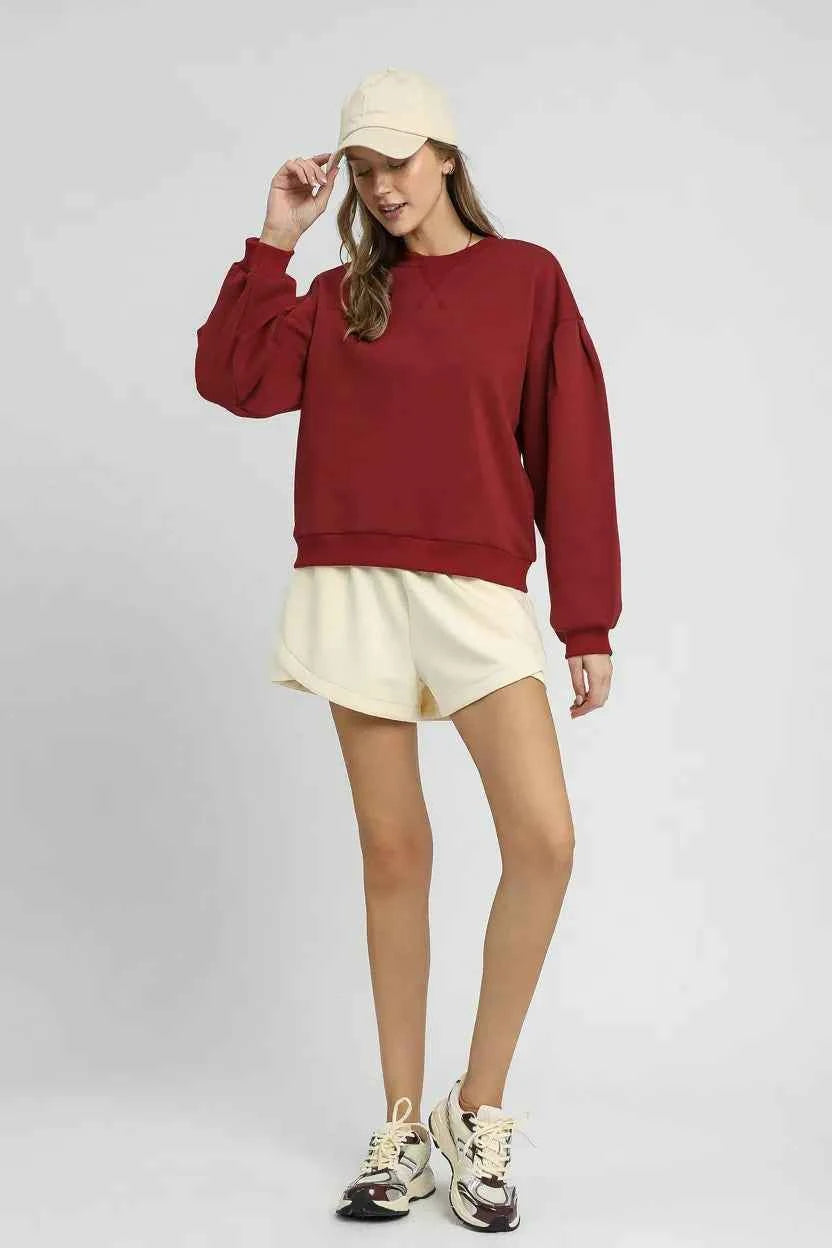 Umgee Round Neck Sweatshirt with Pleated Detail cd84f77a-78a7-4d9a-8ced-932a3f13edb5-Max-Origin