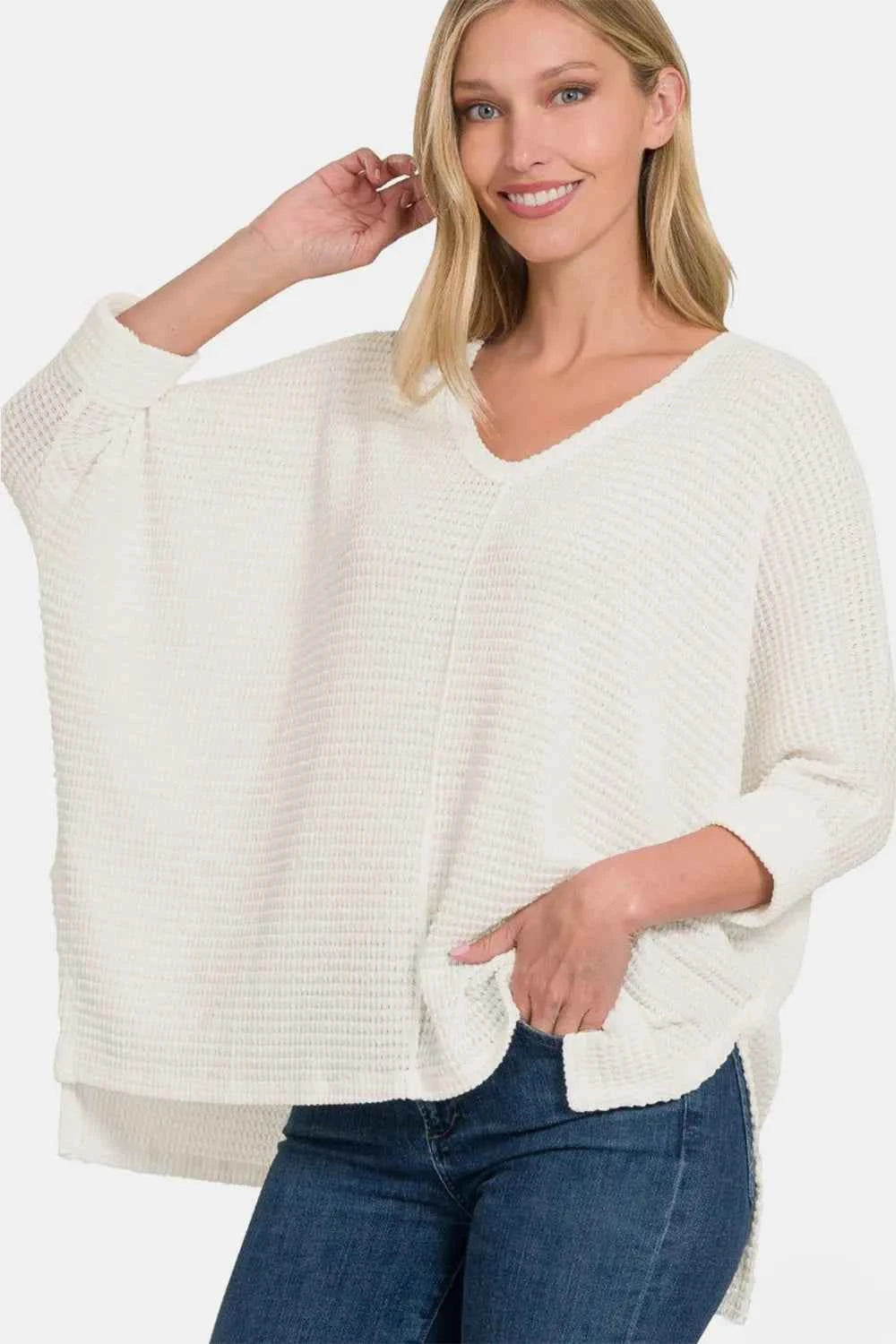 Full Size Round Neck High-Low Slit Knit Top Off White cede023a-8cd1-4173-970f-77f49b152223-Max