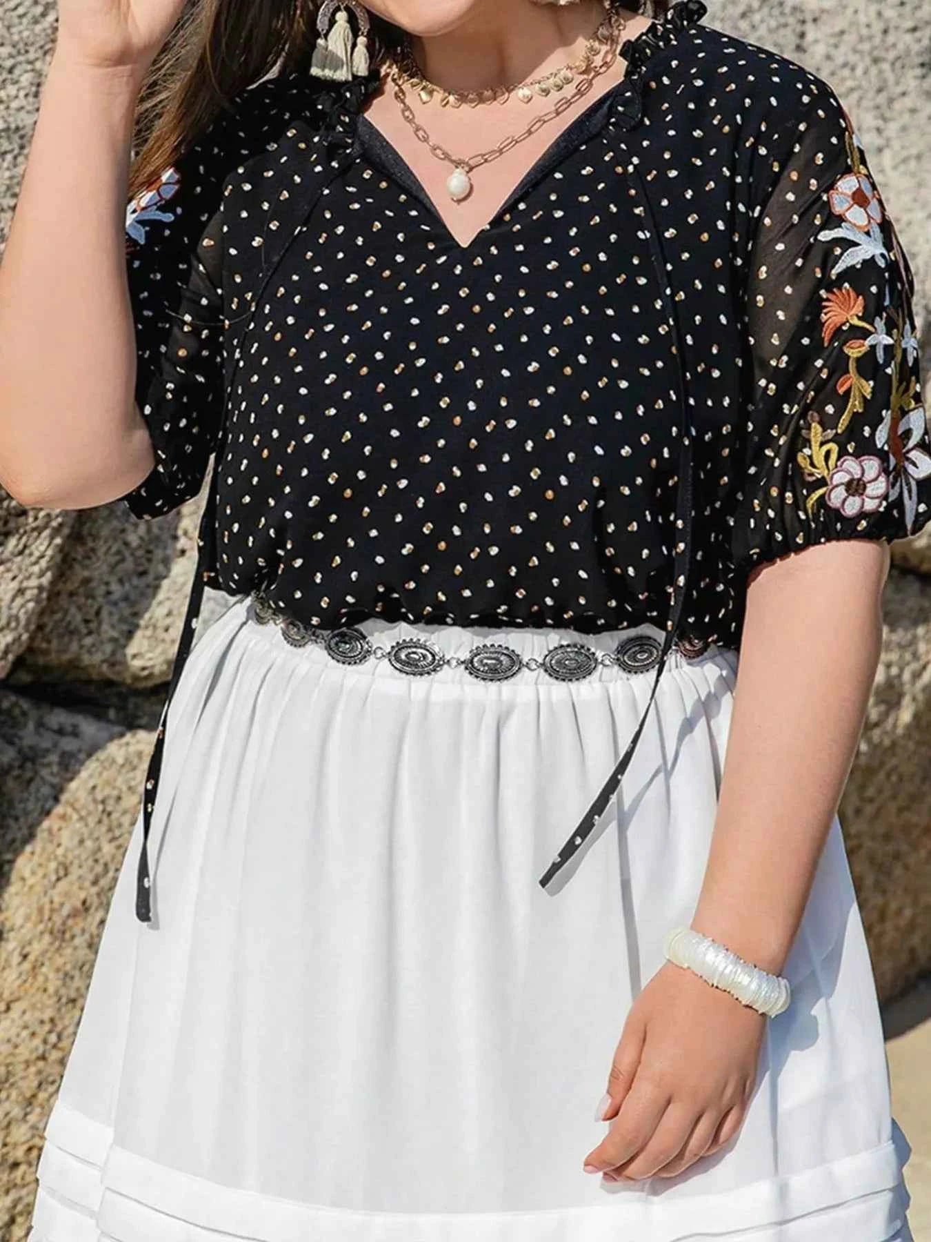 Plus Size Printed Tie Neck Half Sleeve Blouse cee1d59f-7d20-459f-a488-5ceda25e404b-Max-Origin