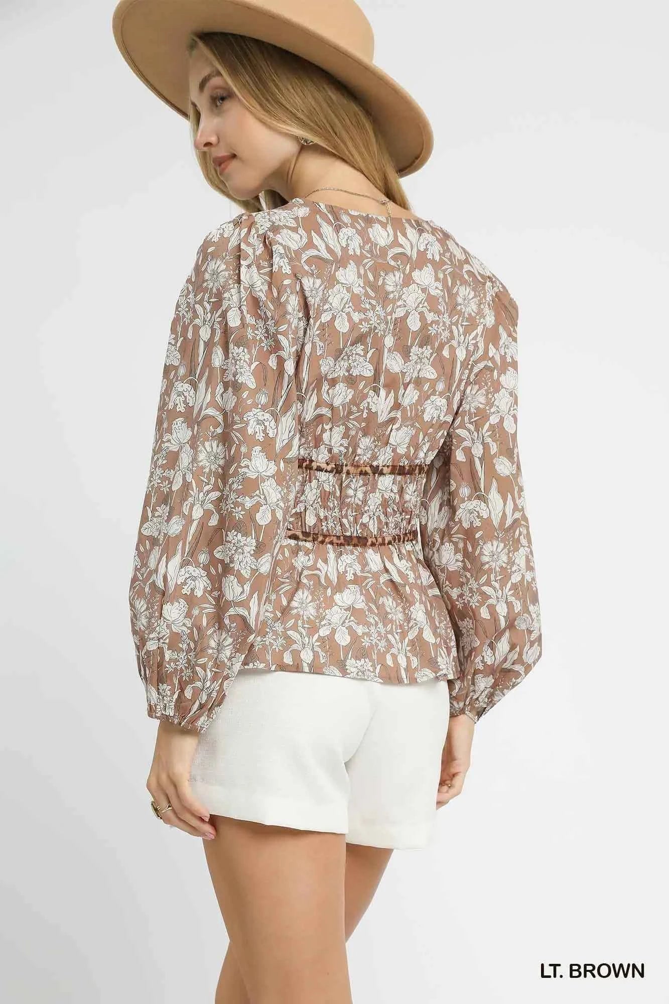 Umgee Floral Smocked Peplum Blouse with Tie Detail cf82467a-265b-4d8a-a069-c94010985430-Max-Origin