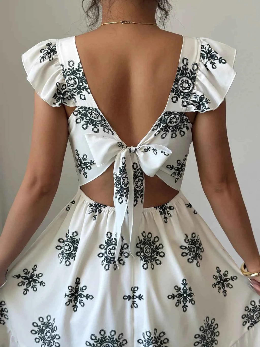 Printed Ruffled Cap Sleeve Dress cfa89677-1424-4282-9ec0-9a8cece365a4-Max-Origin