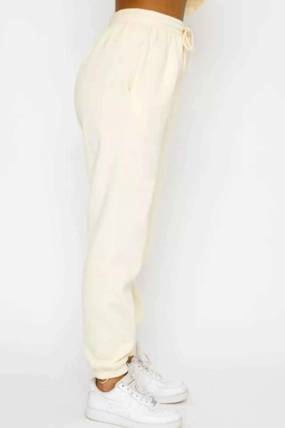 Round Neck Sweatshirt and Joggers Set d00e0450-45a7-4339-98c1-18733a325b7f-Max-Origin