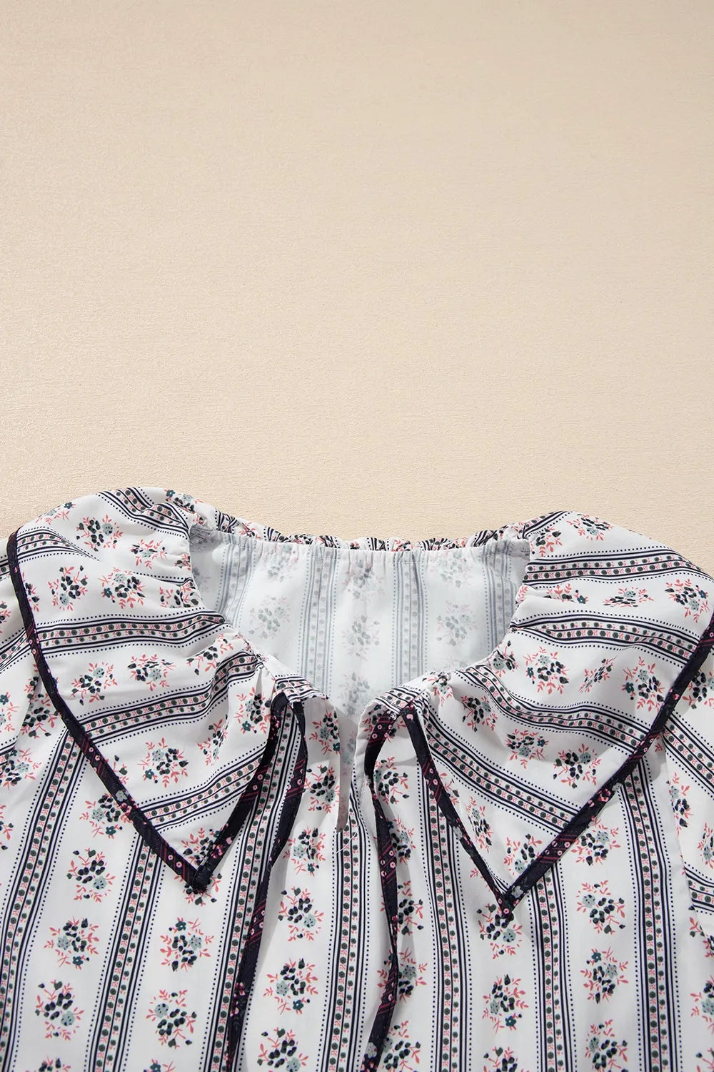 Floral Ruffled Collar Short Puff Sleeve Printed Blouse d0383377-54bd-4c00-82c9-785bb5fd12bc-Max-Origin
