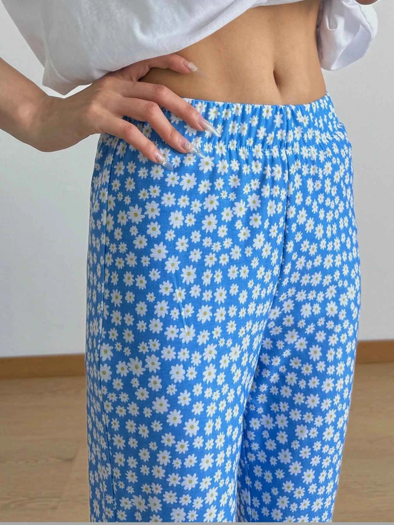 Floral Print Flare Leg Pants d0b76f8db22a4b619e6dfbc599735c61-Max-Origin