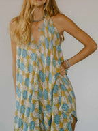 Asymmetrical Hem Printed Halter Neck Dress d11621b3-1e57-4d80-afaa-8f9eb58ec5fe-Max-Origin