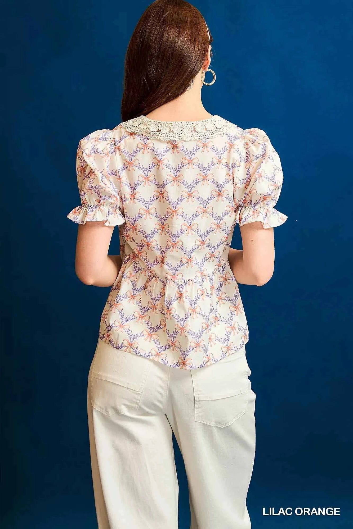 Umgee Lace Detail Bow Print Flounce Sleeve Blouse d13e69b5-46e8-4123-9f82-ca9f78d0eb64-Max-Origin