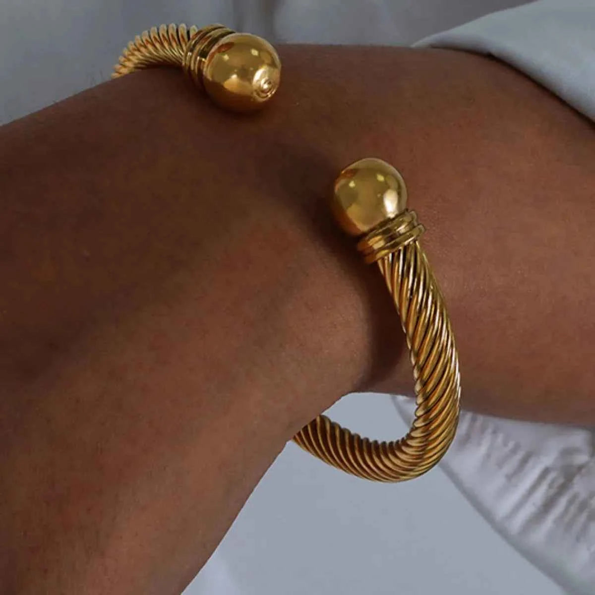 Stainless Steel Twisted Cable Cuff Bracelet Gold One Size d18c4ba8-2613-4027-8d76-705ad2ba8c99-Max-Origin