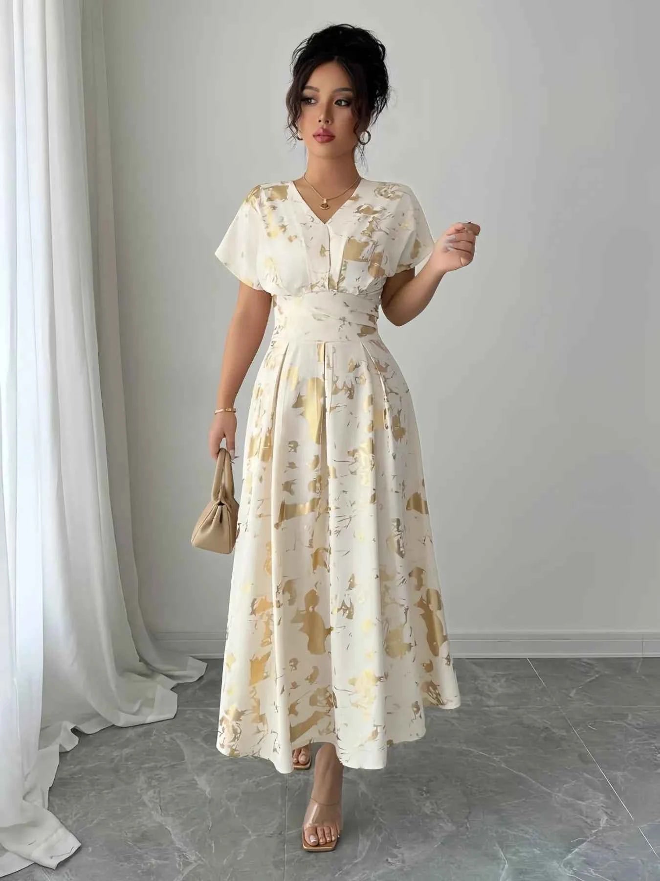 Printed V-Neck Short Sleeve Dress d2b345eb-fa8b-499c-b8c4-3f528823a498-Max-Origin