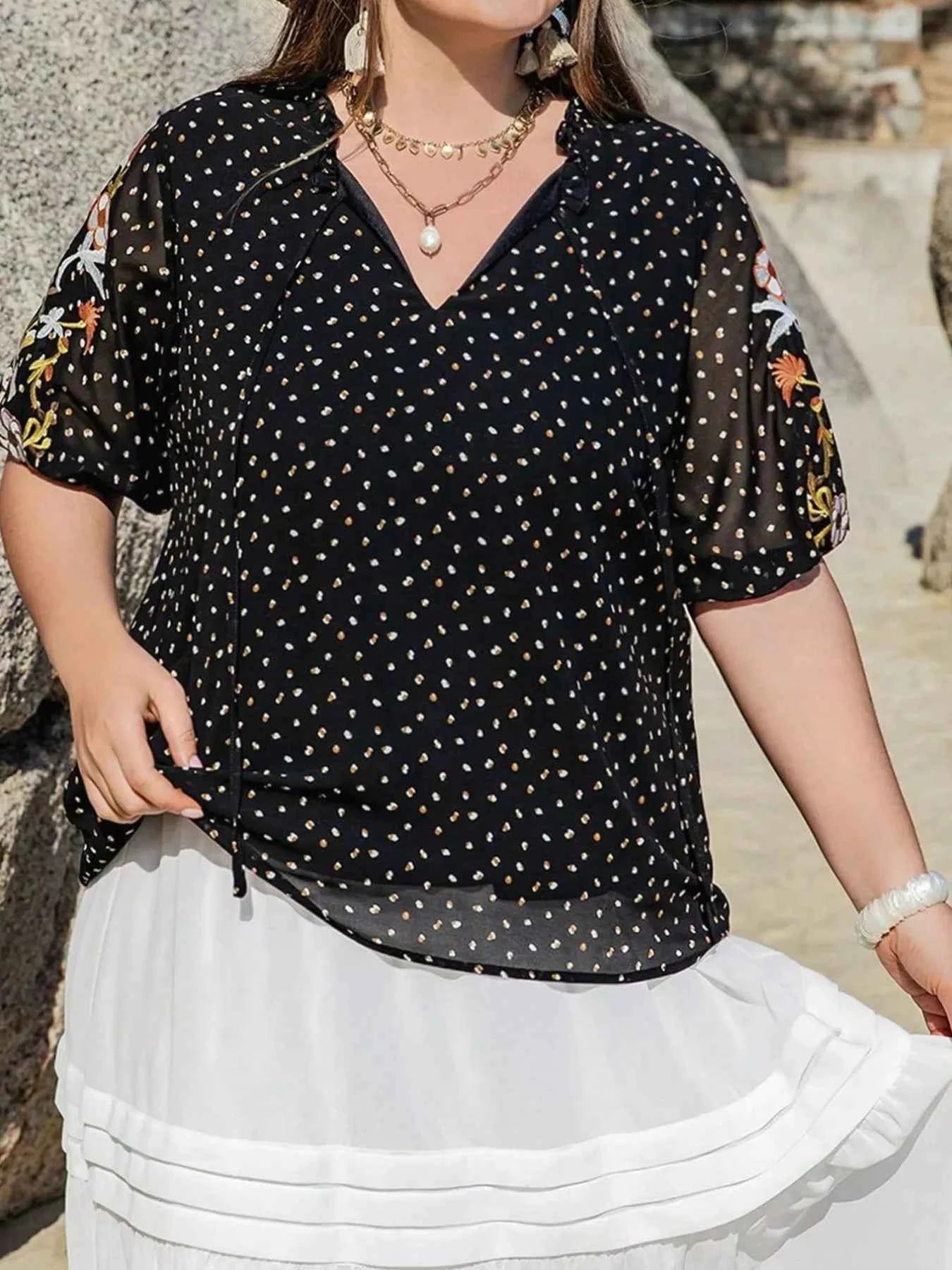 Plus Size Printed Tie Neck Half Sleeve Blouse d5a6e3e2-cf0f-47bb-a902-830f99f88431-Max-Origin