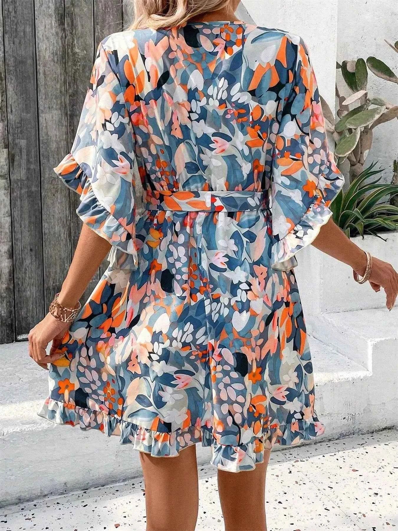 Printed Surplice Half Sleeve Dress d83b9af1a7d64dd99e4d092aca84e9c9-Max-Origin