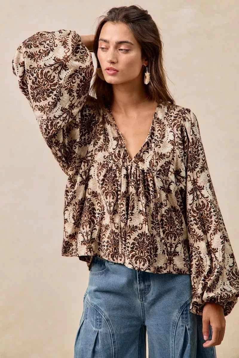 BiBi Printed Woven Front Tied Blouse with Baloon Sleeve d84e18f515994613bad58754fd8db9cd-Max-Origin
