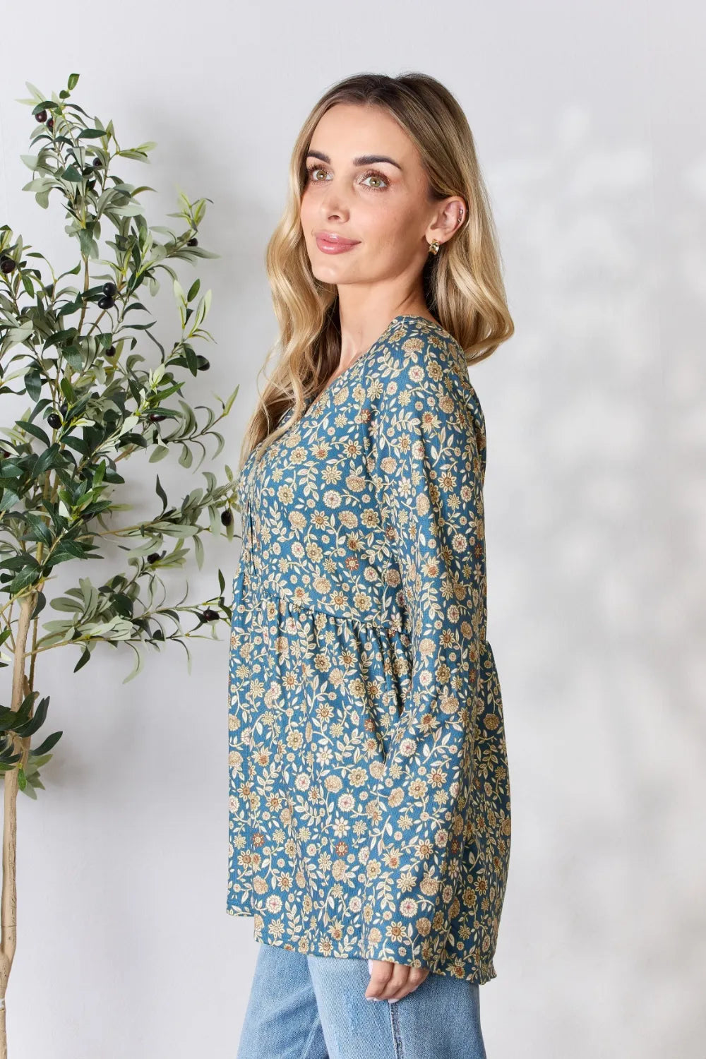 Heimish Full Size Floral Half Button Long Sleeve Blouse d92a3affbdc54e8491130eadd98e4961-Max