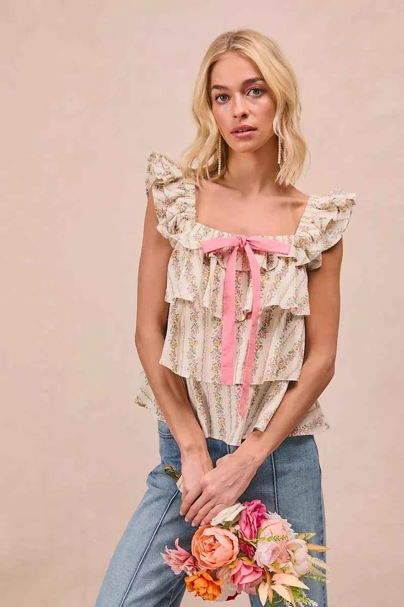 BiBi Floral Printed Woven Front Bow Tied Ruffled Square Neck Sleeveless Top da79d81e488844ca8c98a8f0e274b770-Max-Origin