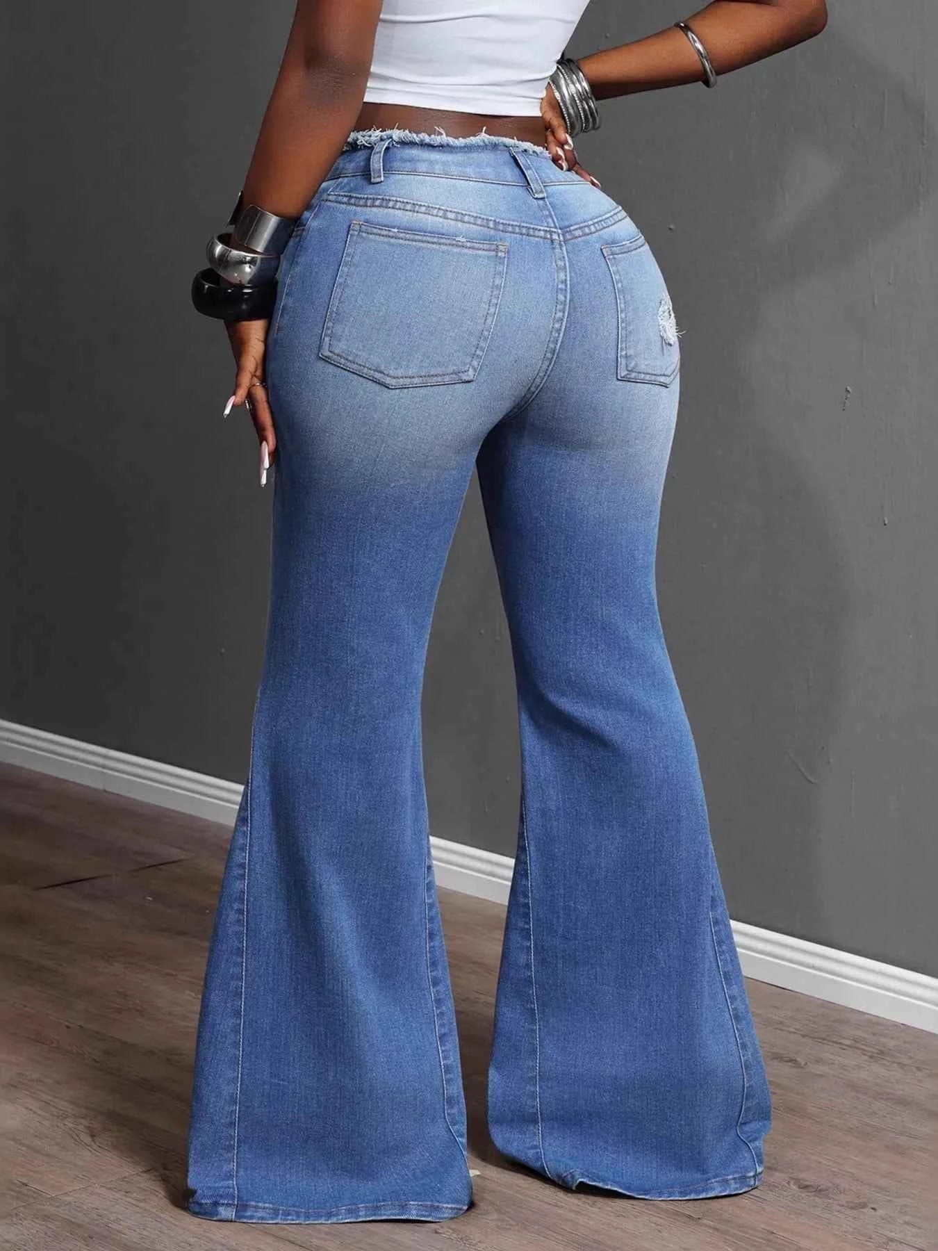 High Waisted Distressed Flare Jeans dc455f4da63644ecbd480e0d9e25f09d-Max-Origin