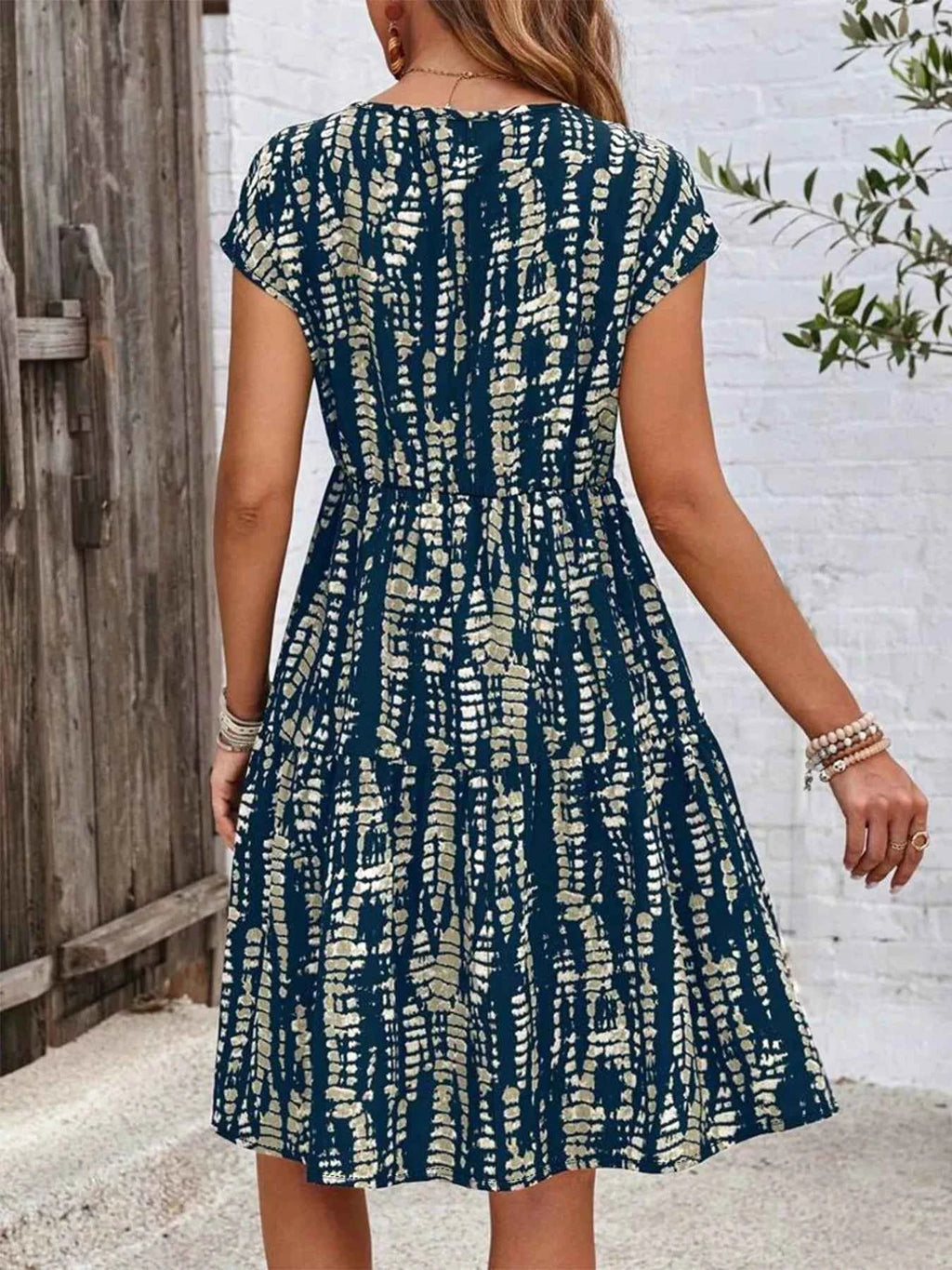 Plus Size Printed Long Sleeve Ruffle Hem Mini Dress dcaddfb4-650d-48f1-bf57-cb4d79aedff0-Max-Origin