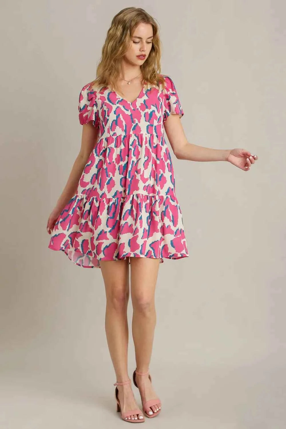 Umgee Full Size Abstract Print Pleat Detail Short Sleeve V-Neck Tiered Dress Plus Size dd03d81d-ad97-44ae-b621-6021d09a7ce8-Max