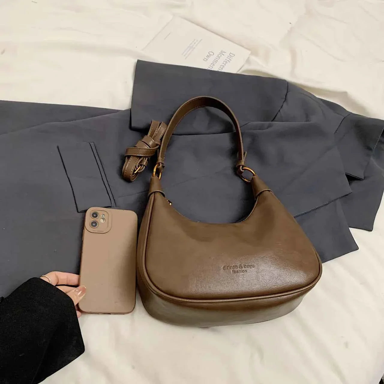 Curved Leather Shoulder Bag de07a6a88a6c4d8397941deeb8596cd5-Max-Origin