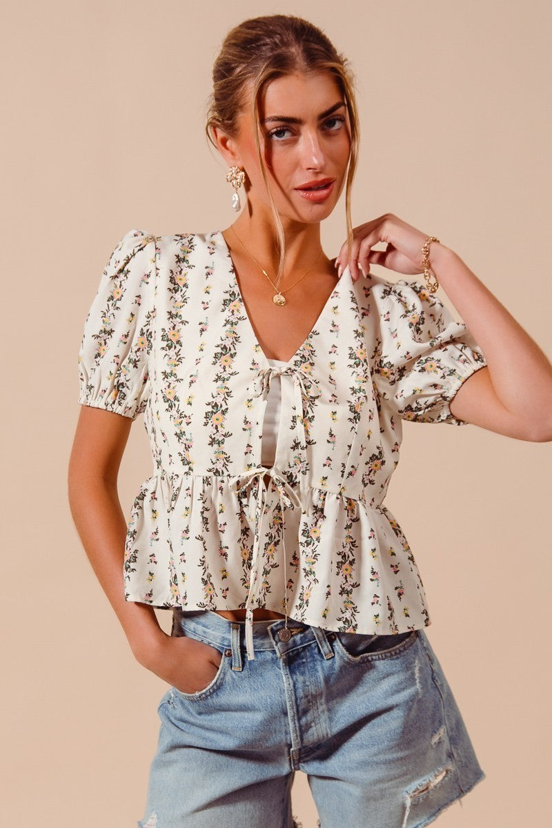 SO ME Floral Print Tie Front Shirred Hem Blouse df3cfce9daea4490bdf3c74155b86c49-Max