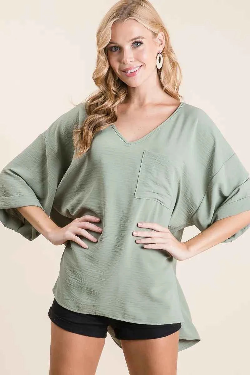 Flowy Woven V-Neck Top with Rolled Up Cuffs df77dcd1b06d4f10bb5bc911264be94a-Max-Origin
