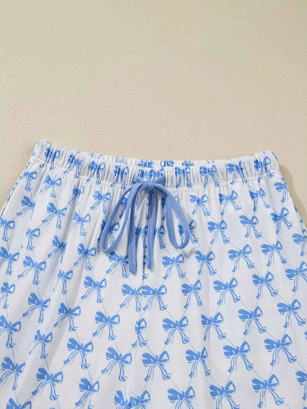 Bow Print Long Sleeve Shirt and Pants Pajama Set e102cdbef715493d9a2e94216392b502-Max-Origin