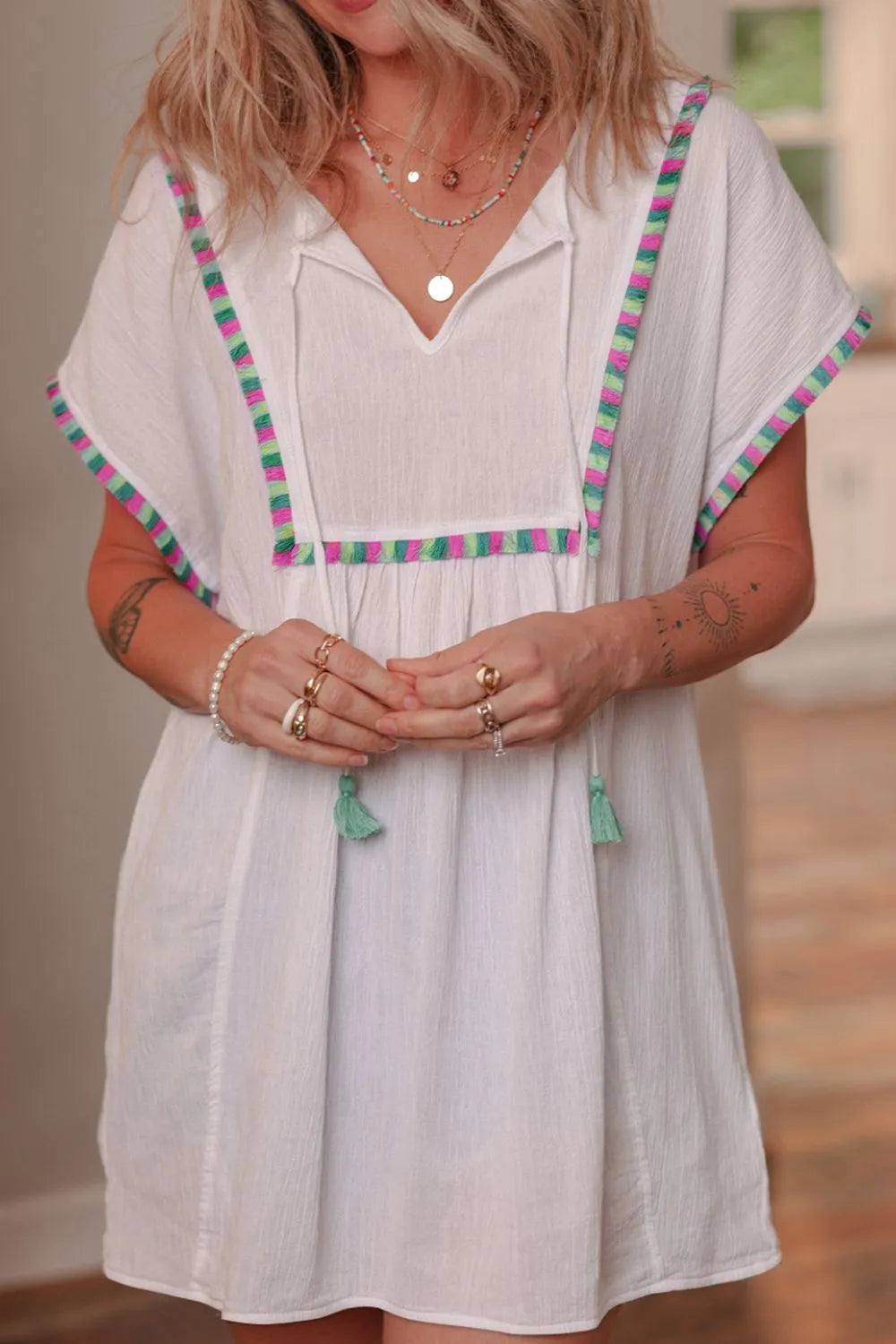 Tassel Tie Neck Short Sleeve Blouse e13eb815-8f9c-43c1-9c9e-c1c68dded45b-Max