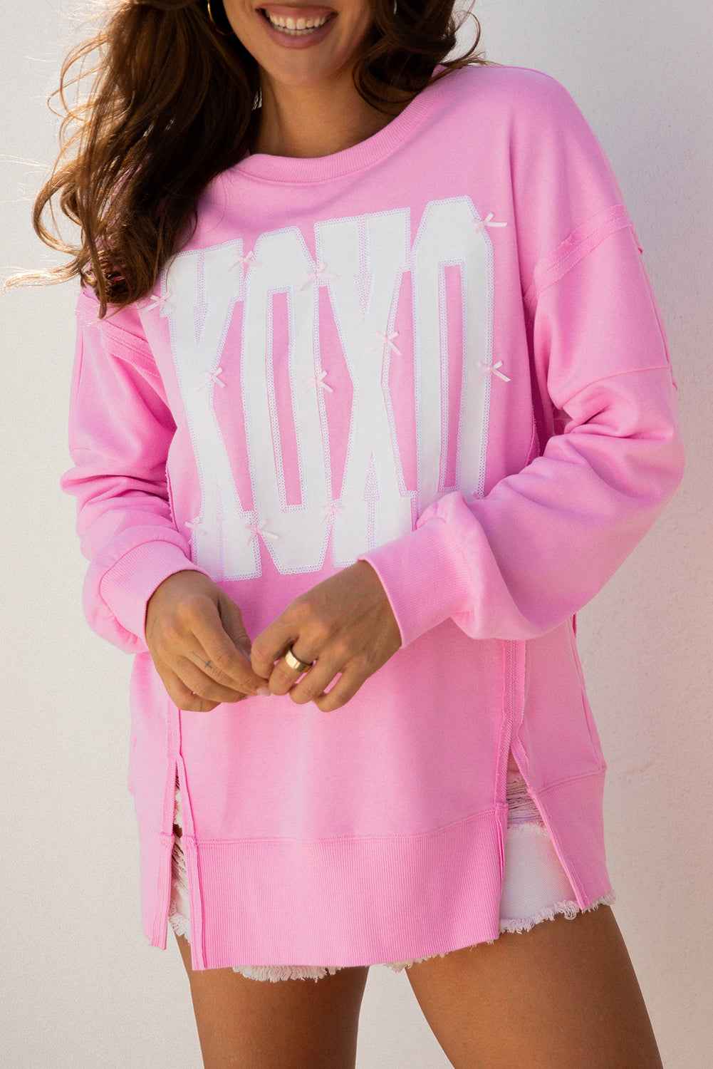 Pink Bow Sequin XOXO Letter Graphic Exposed Seam Baggy Sweatshirt e1b418aa8475631d