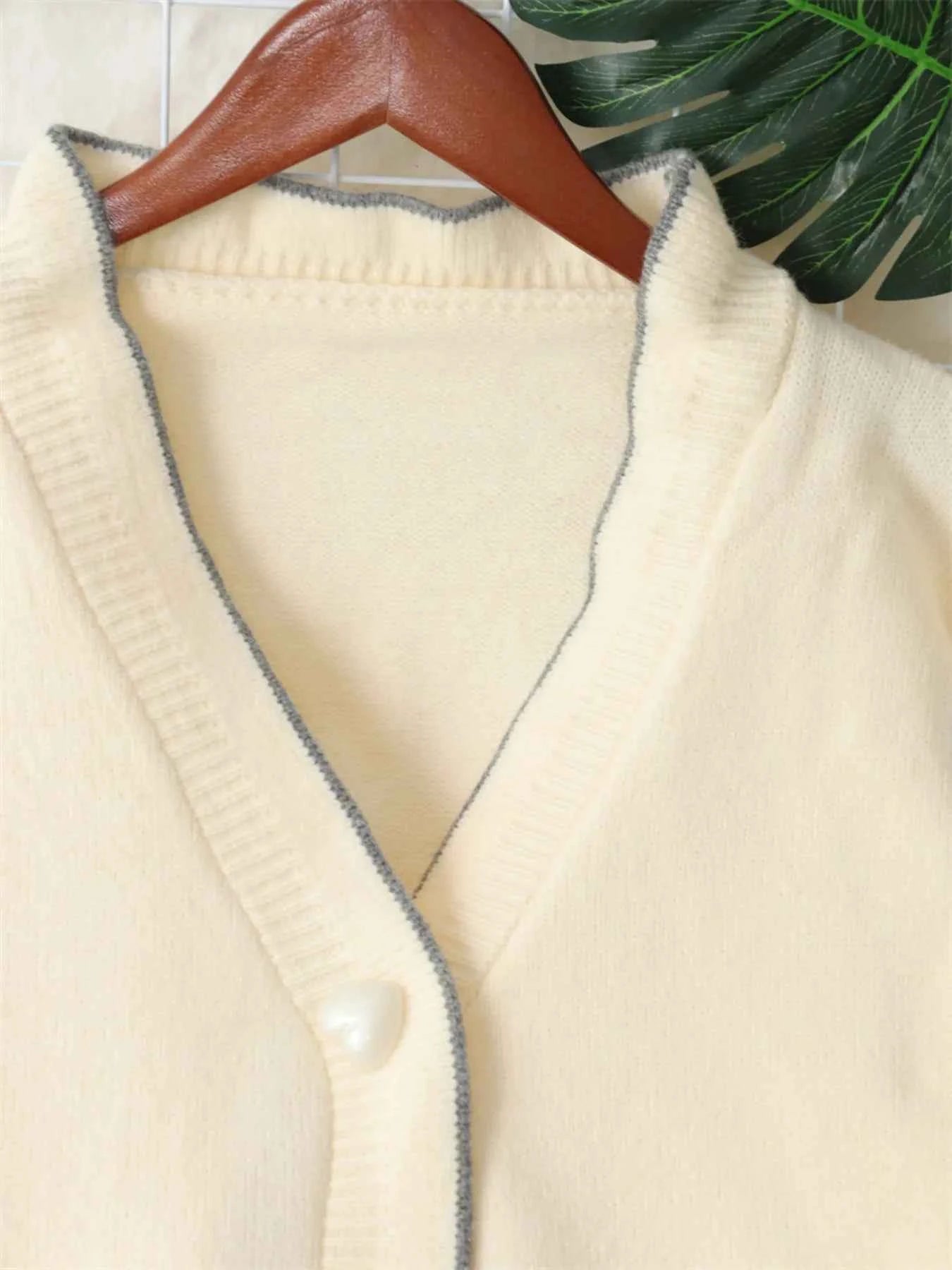 Bow Tie Button Up Cardigan e1c95dff6a3b435e9b4e10e2be9cecfe-Max-Origin