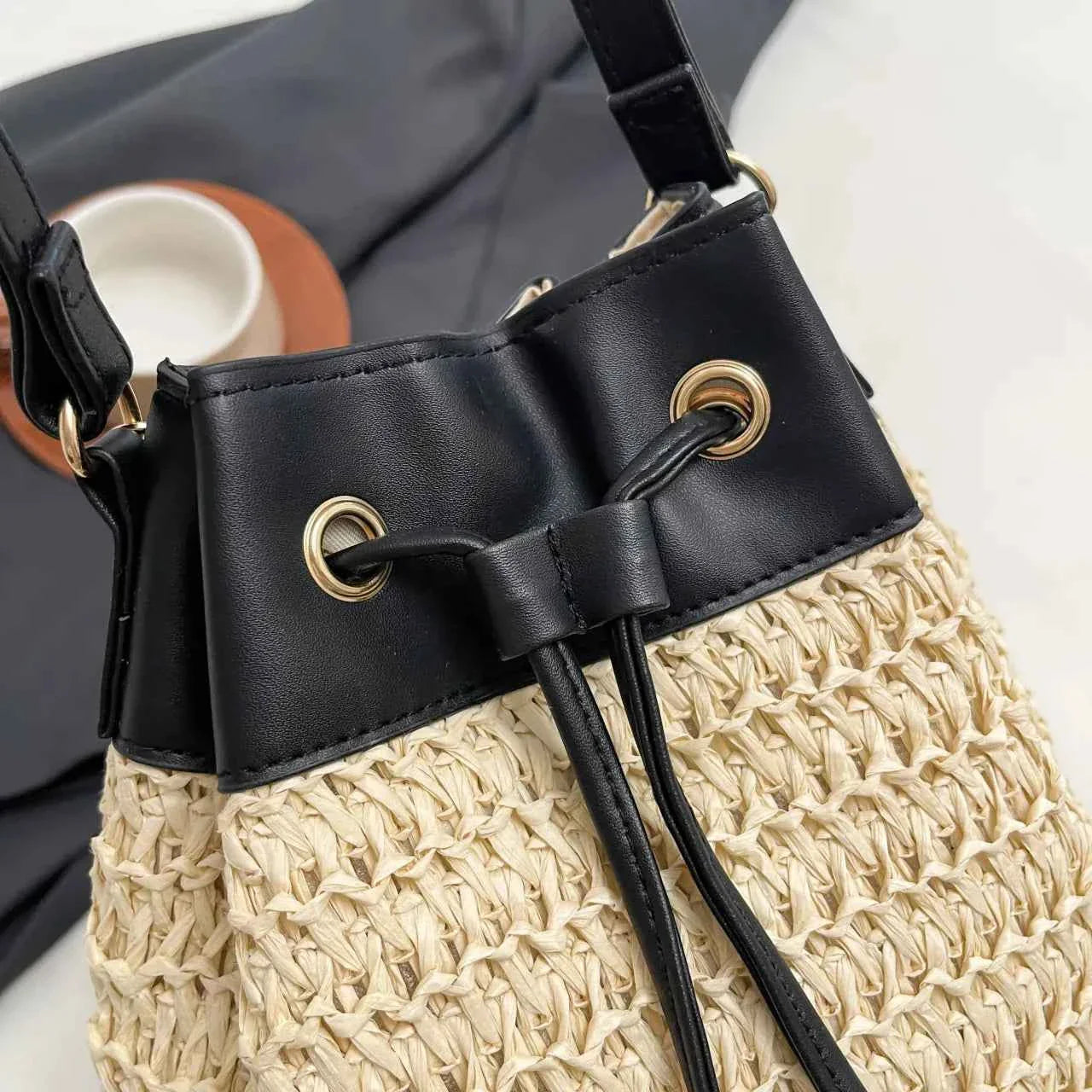 Straw Woven Crossbody Bag with Black Drawstring e416c93188664a3eb96710573d06c5e7-Max-Origin