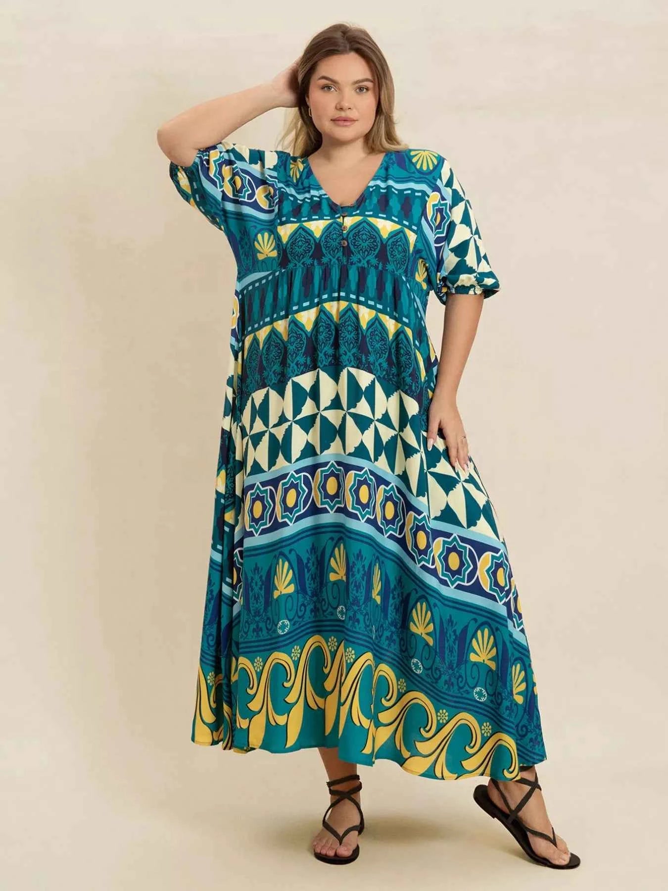 Plus Size Printed V-Neck Half Sleeve Midi Dress e4cabccf-bbc8-4890-9e1c-81cf5607fb1c-Max-Origin