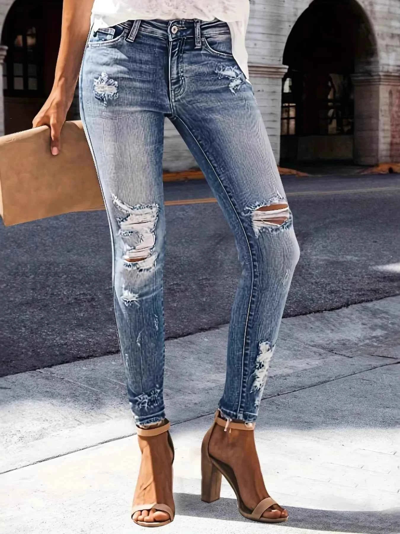 Distressed Skinny Jeans e578ef06c9984605a318f6845ac1ea66-Max-Origin