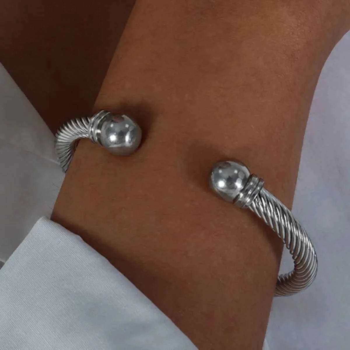 Stainless Steel Twisted Cable Cuff Bracelet e66abbbc-f95e-42a4-bae1-7ff810e61b37-Max-Origin