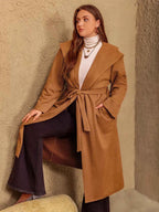 Plus Size Tied Long Sleeve Hooded Coat with Pockets e7b01f14-764c-4d93-b183-f457a1546b6a-Max