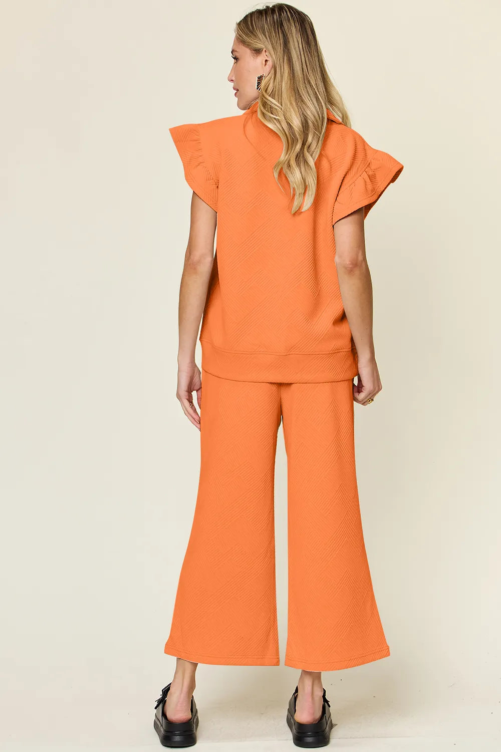 Double Take Texture Ruffle Short Sleeve Top and Drawstring Wide Leg Pants Set e7f6f8c9-5a0c-4f1e-9ad0-facca7c9cbb8-Max