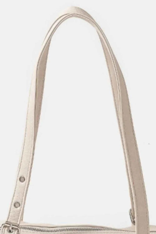Fame Multi Grommet Belt Strap Rustic Rectangular Hand Bag e93ff5e9-3da9-4e9a-83b7-7700c0bbc284-Max-Origin