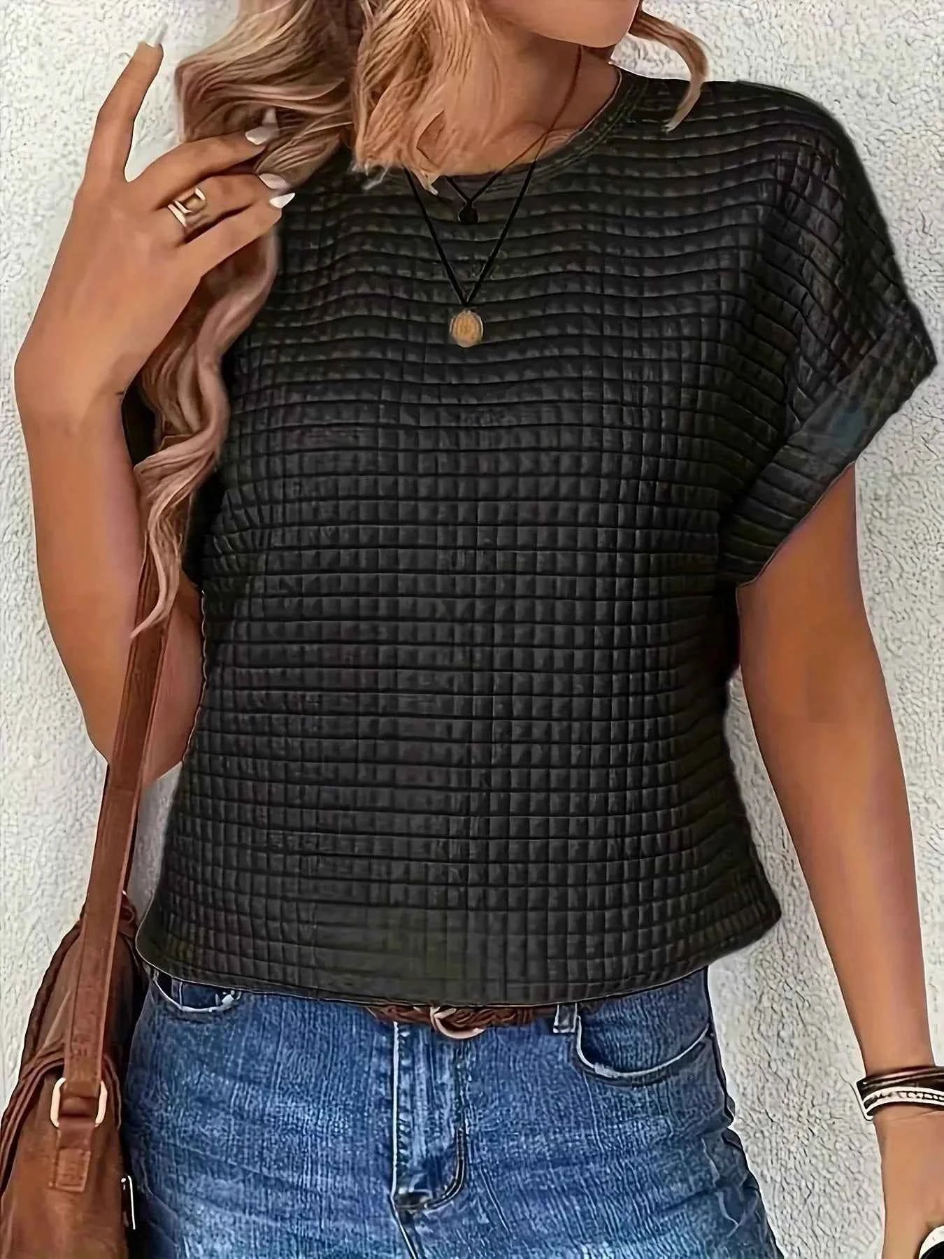 Plus Size Textured Round Neck Short Sleeve Top eaf1686ce243431bb24240895730f79f-Max-Origin