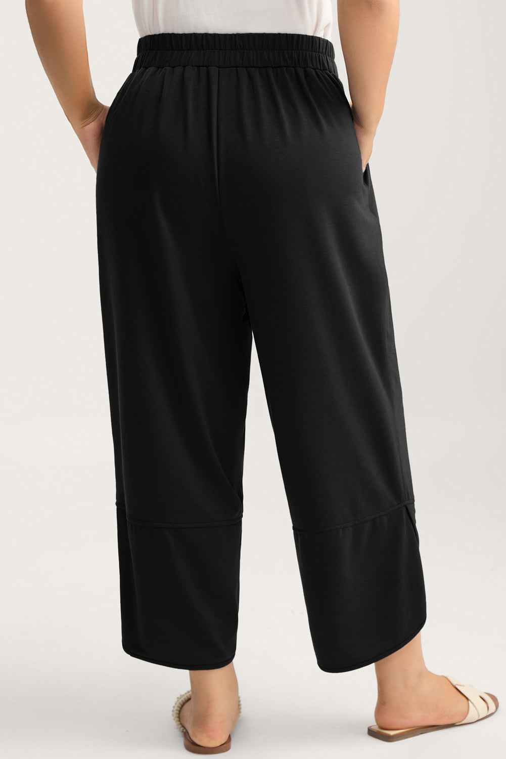Black Plus Size Elastic Waist Asymmetrical Hem Loose Capris Pants eb1e0b193c8f0bb5