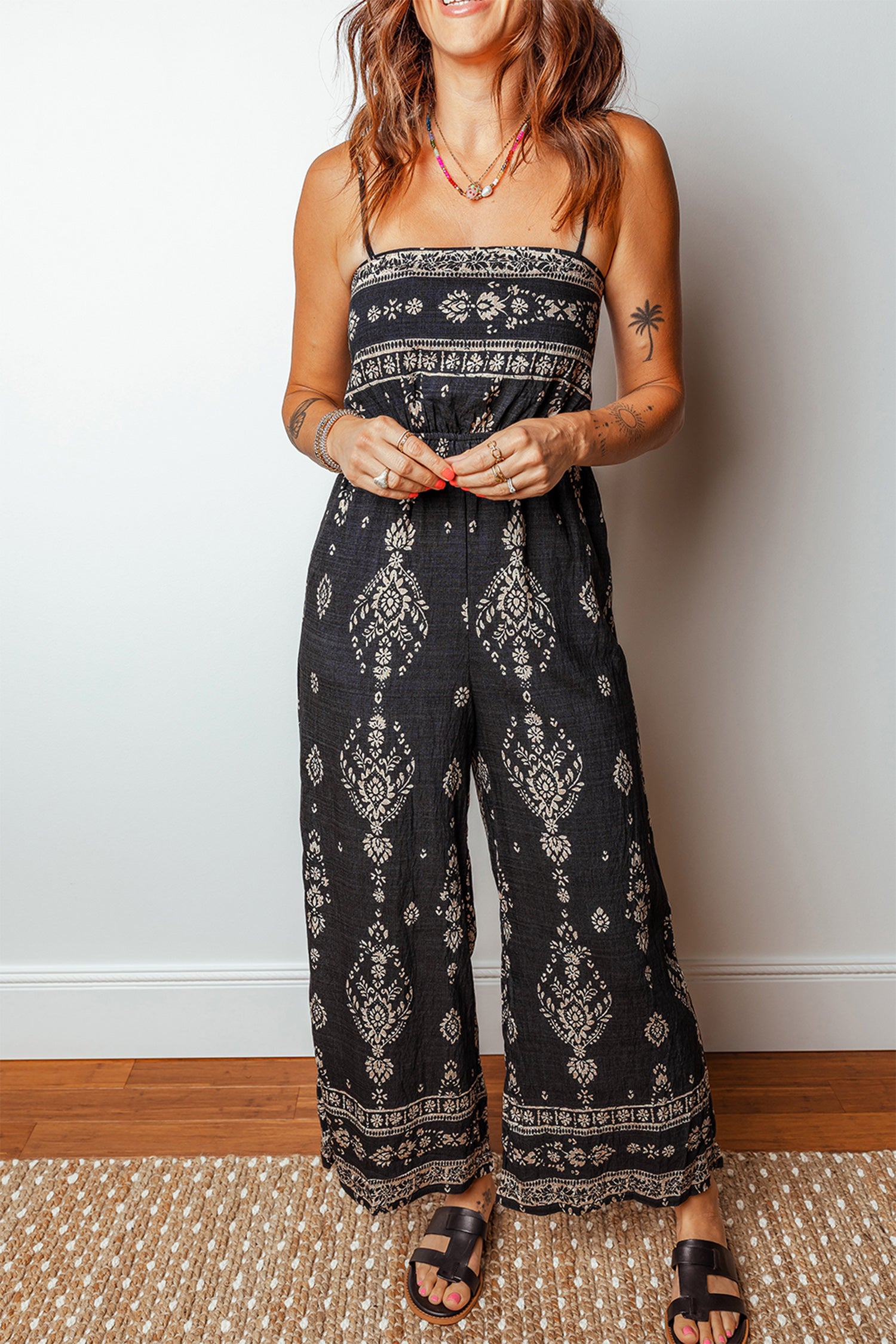 Black Spaghetti Straps Elastic Waist Loose Ethnic Print Jumpsuit ed2534b3bc1e3477