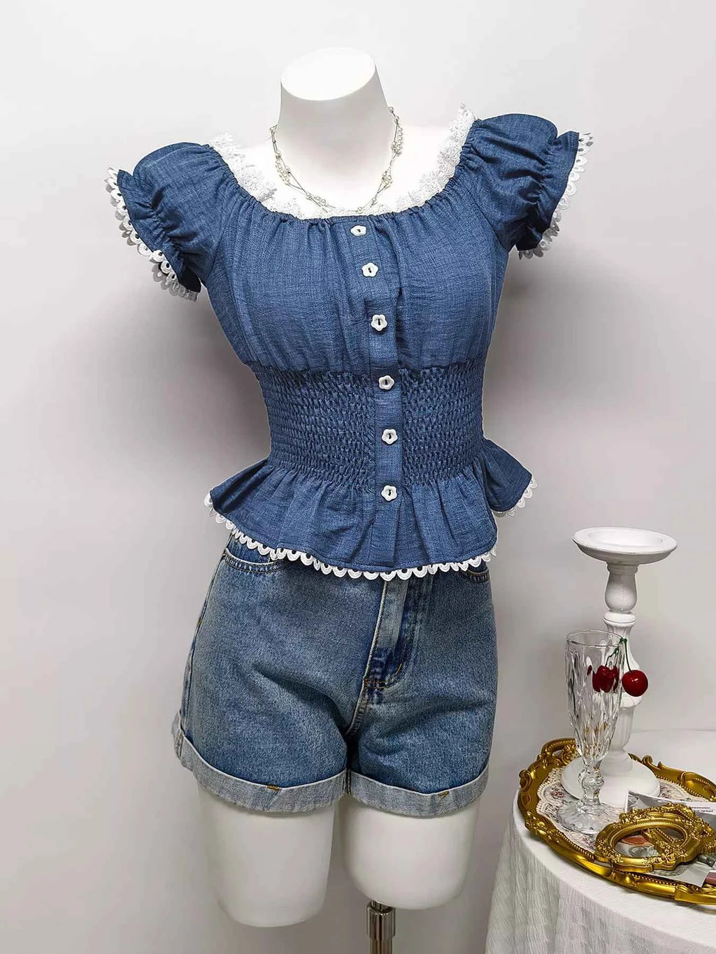 Smocked Short Sleeve Blouse edb1a273040649b6a0e200449d605ed0-Max-Origin