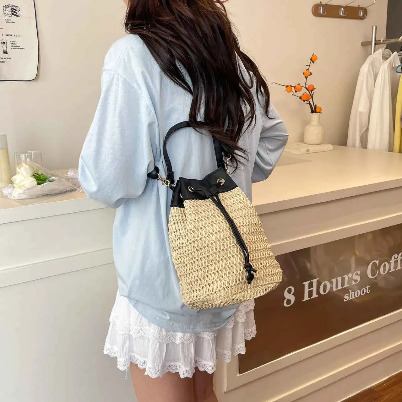 Straw Woven Crossbody Bag with Black Drawstring f29c4b09ada94820934eec66afda333b-Max-Origin