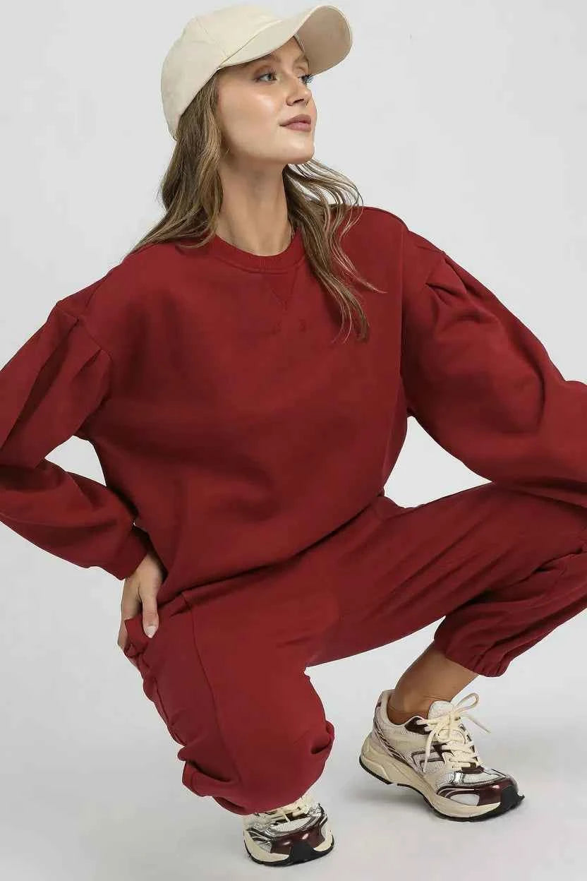 Umgee Round Neck Sweatshirt with Pleated Detail f3aab805-348c-42c1-a5c1-6a8b6154ccef-Max-Origin