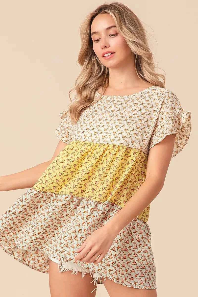 BiBi Flroal Printed Woven Color Block and Tiered Top f6266b5f163c466eb51a589695b9d126-Max-Origin