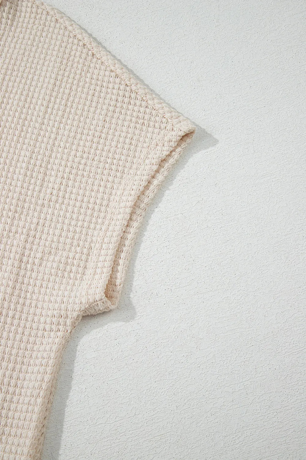 Solid Color Textured Seamed Short Sleeve Top f82024f6-0ea3-4b61-84fc-a3788b7f6943-Max-Origin