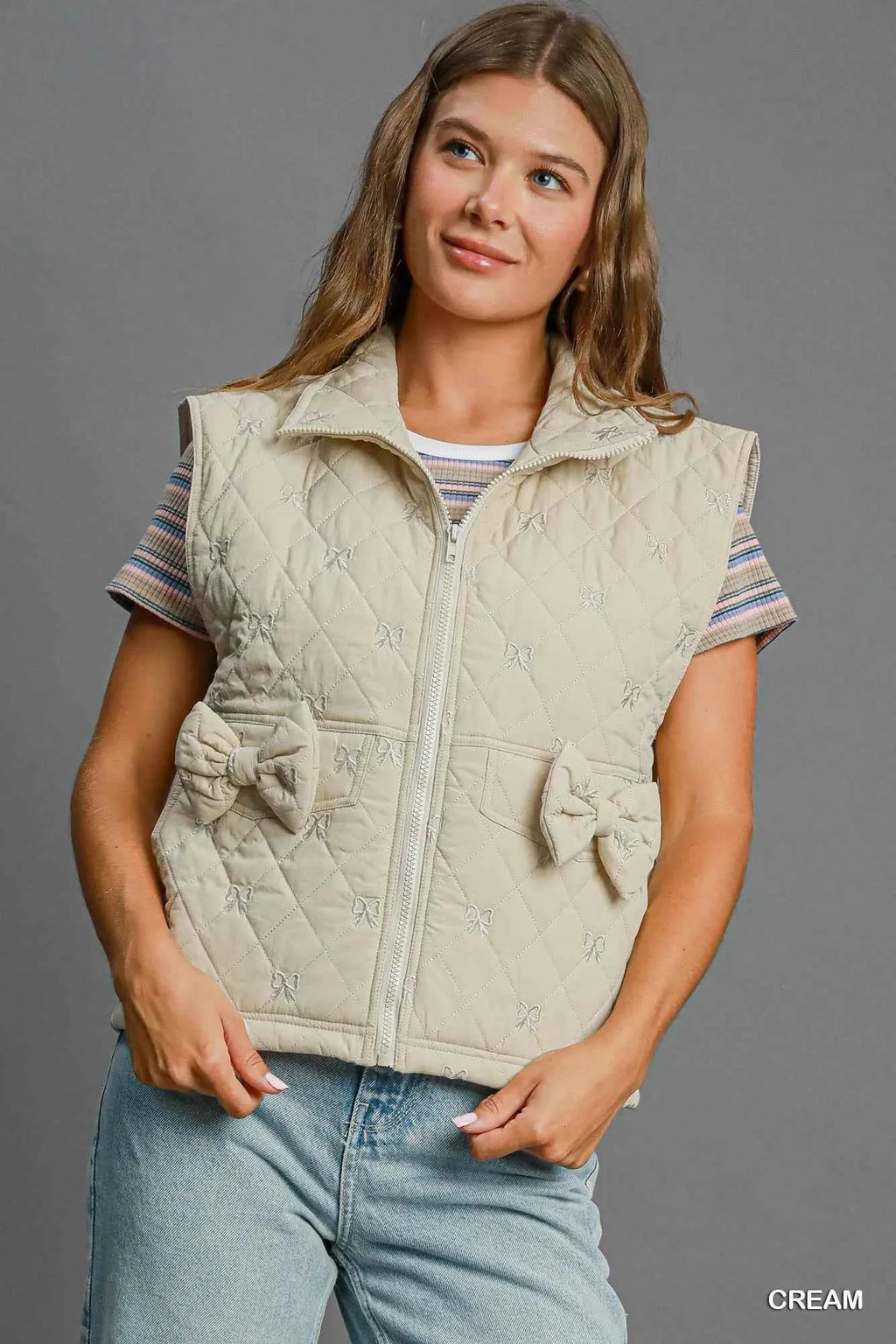 Umgee Sleeveless Quilted Vest with Bow Details CREAM f8e2b3c4-7a9a-4f3b-bca9-0e3b3dd250e8-Max-Origin
