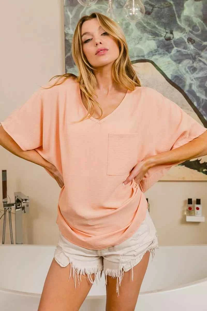 BiBi Woven V Neck Hi-low Boxy Top With Front Pocket fa433f45-d31d-4ae1-99be-8bf7c5f13e40-Max-Origin